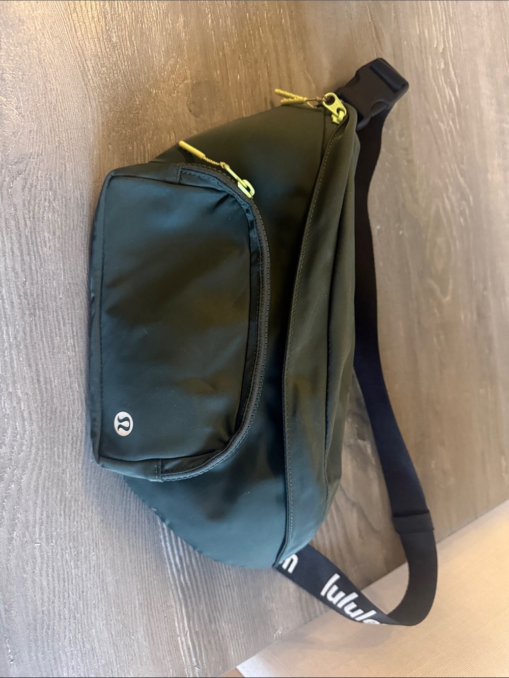lululemon athletica women’s Forest Green Sling Belt Bag with Black Strap